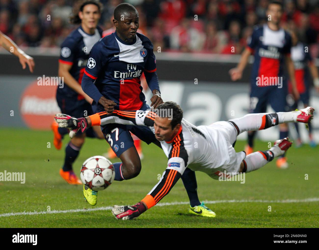 PSG's Kalifa Traore tries to beat Benfica goalkeeper Artur Moraes