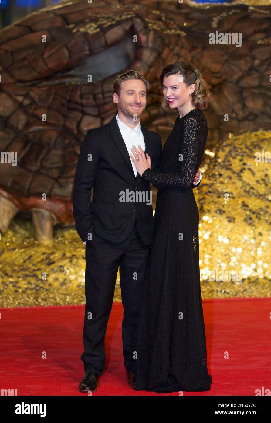 Dean O'Gorman, left, and his girlfriend Sarah Wilson arrive for the  European Premiere of the movie "The Hobbit: The Desolation of Smaug" in  Berlin, Germany, Monday, Dec. 9, 2013. (AP Photo/Gero Breloer