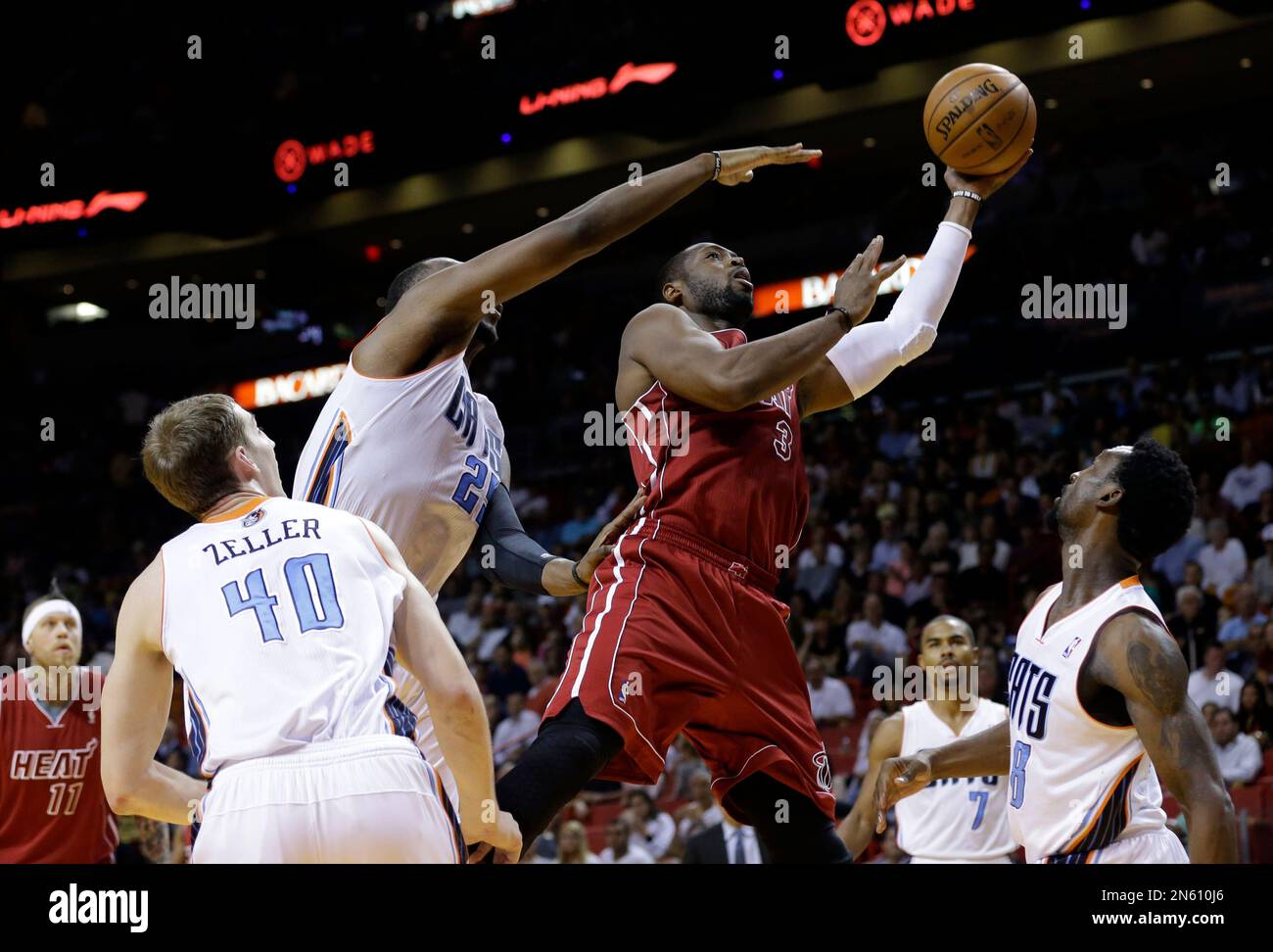 Miami Heat's Dwyane Wade (3) shoots over Charlotte Bobcats' Al ...
