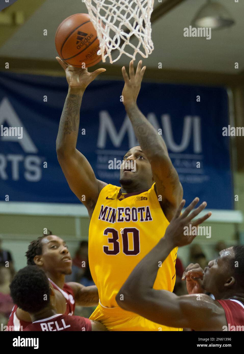 Minnesota guard Malik Smith (30) takes a shot in the first half of an