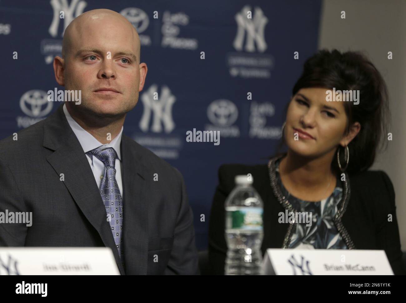 Brian McCann and his wife Ashley McCann at a news conference at Yankee  Stadium in New York, Thursday, Dec. 5, 2013. All-Star catcher Brian McCann  completed his $85 million, five-year contract with