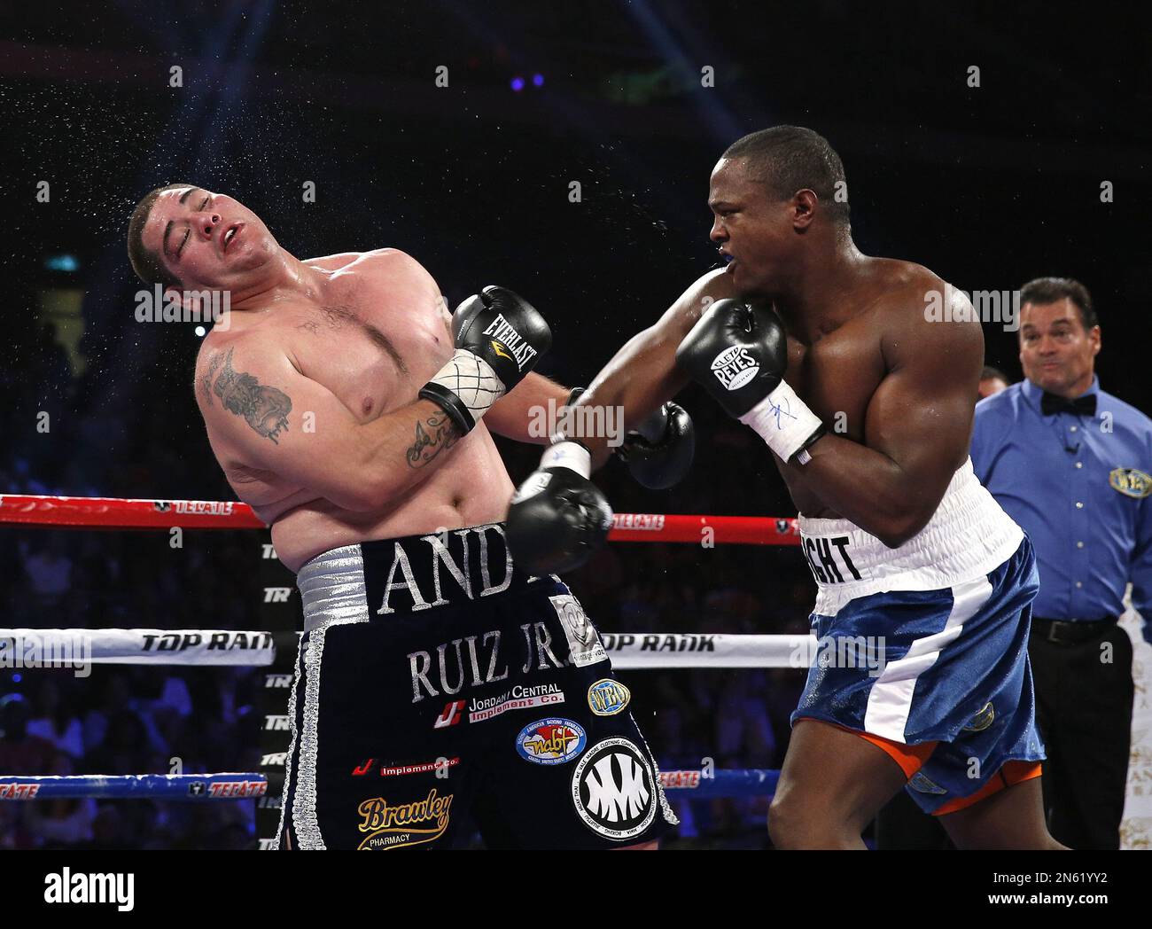 Tor Hamer of the United States, right, delivers a punch against Mexico