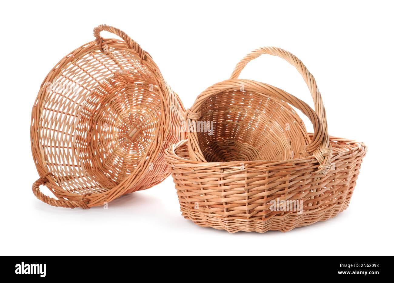 Three decorative wicker baskets on white background Stock Photo Alamy