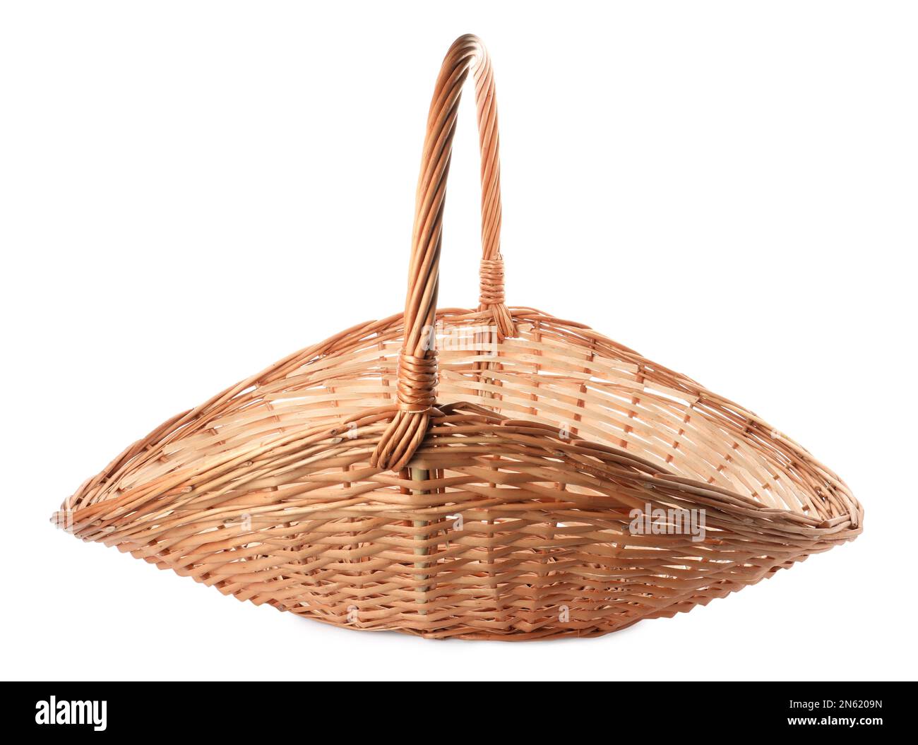 Wicker basket with handle isolated on white Stock Photo - Alamy