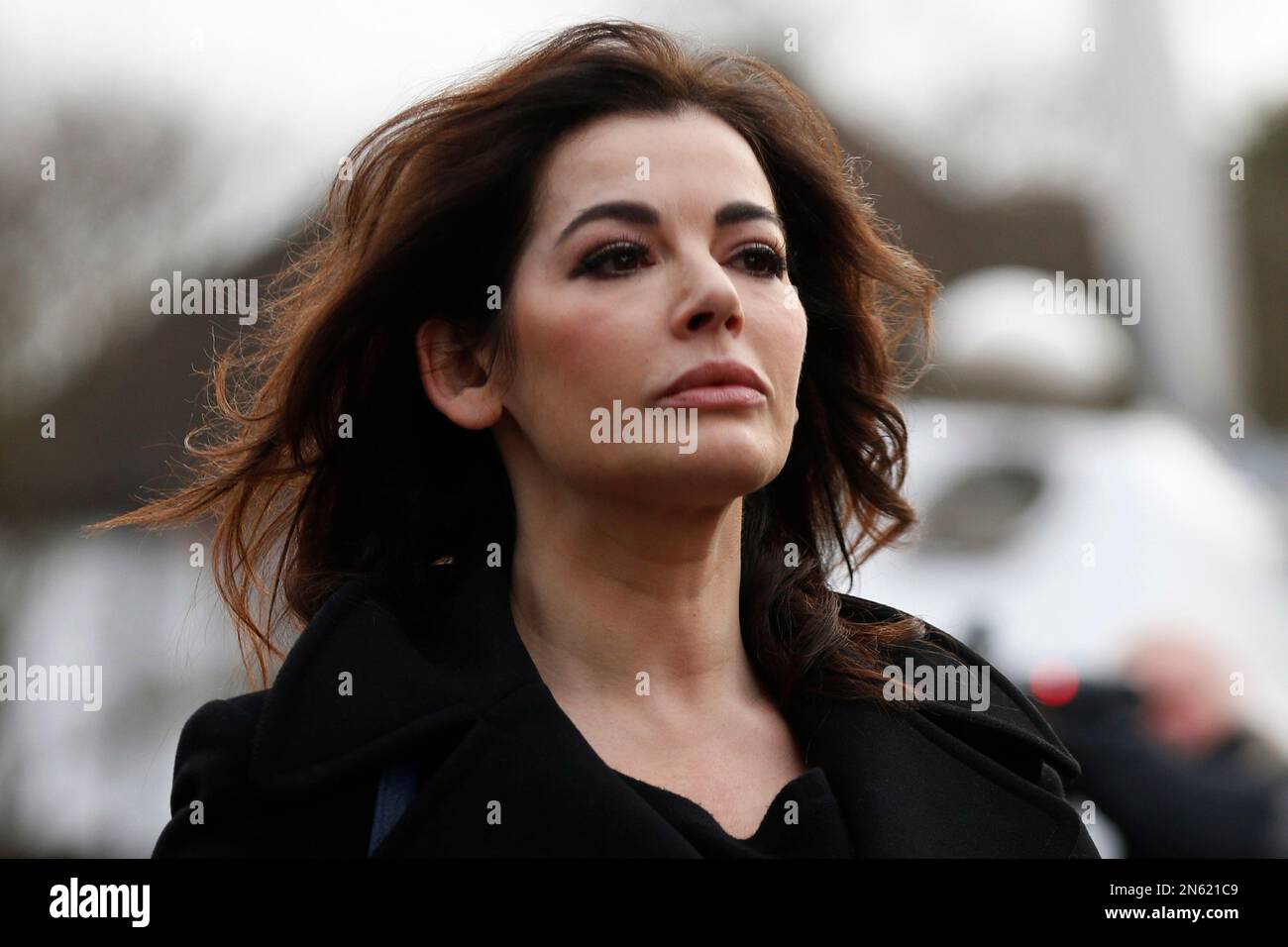 Celebrity chef, Nigella Lawson, arrives at Isleworth Crown Court in London,  Thursday, Dec. 5, 2013. Lawson arrived at court on Thursday for a second  day where she will testify as a prosecution