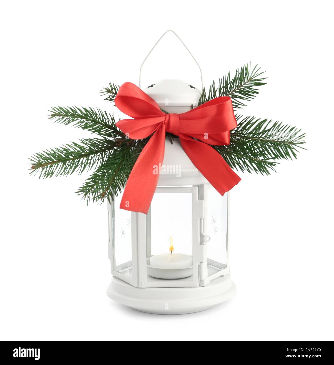 Decorative Christmas lantern with bow and coniferous twigs isolated on white Stock Photo