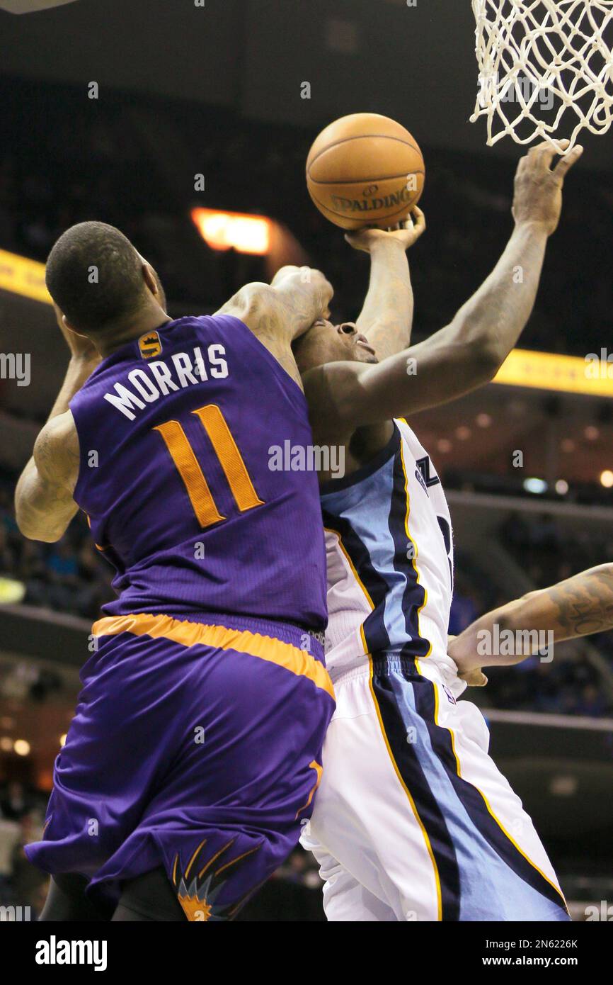 Memphis Grizzlies forward Ed Davis, right, is fouled by Phoenix Suns  forward Markieff Morris (11) in the second half of an NBA basketball game  in Memphis, Tenn., Tuesday, Dec. 3, 2013. The, image size:866x1390