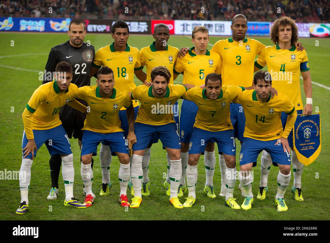 FILE - In this Oct. 15, 2013 file photo, Brazil soccer team poses prior ...