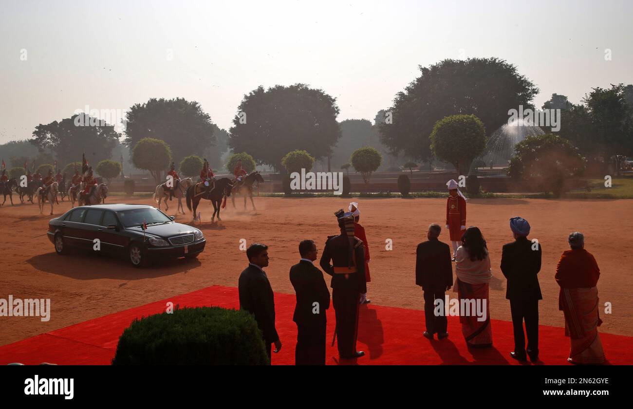Japan's Emperor Akihito and Empress Michiko, arrive in a limousine for their ceremonial