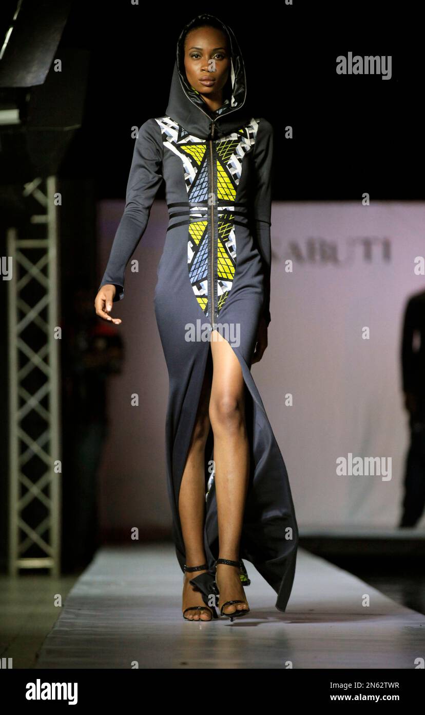 A model displays creations by Kinabuti in Lagos, Nigeria, Saturday, Nov.  30, 2013. Kinabuti, a Nigerian fashion house run by Italian designer  Caterina Bortolussi, featured its 2013 collection Saturday night in a