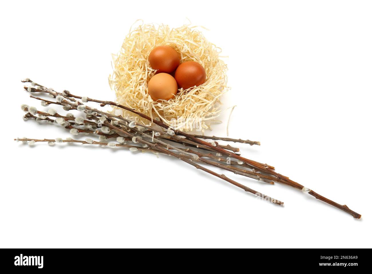 Nest with Easter eggs and willow branches on white background Stock ...