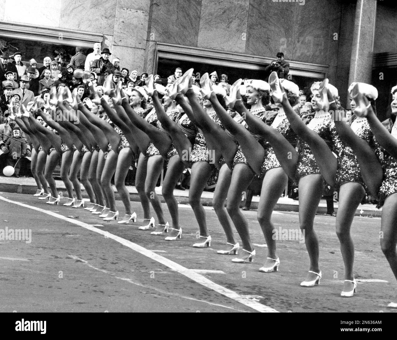 1958 - Members of the Radio City Music Hall's Rockettes perform in the  annual Macy's Thanksgiving Day Parade in New York on Nov. 27, 1958. Police  reportedly estimated more than 1.2 million, image size:1300x1114