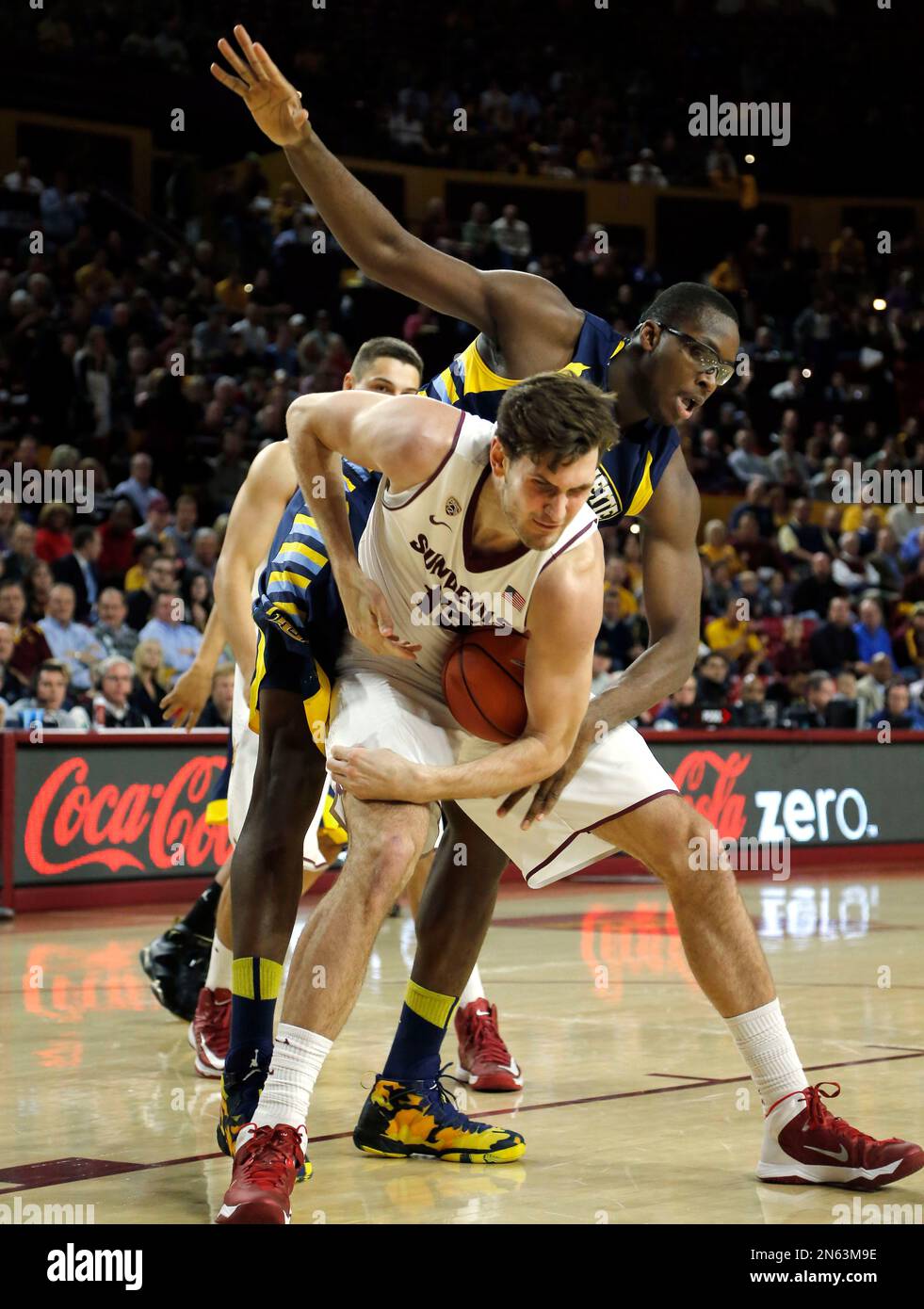 Marquette center Chris Otule, battles Arizona State center Jordan