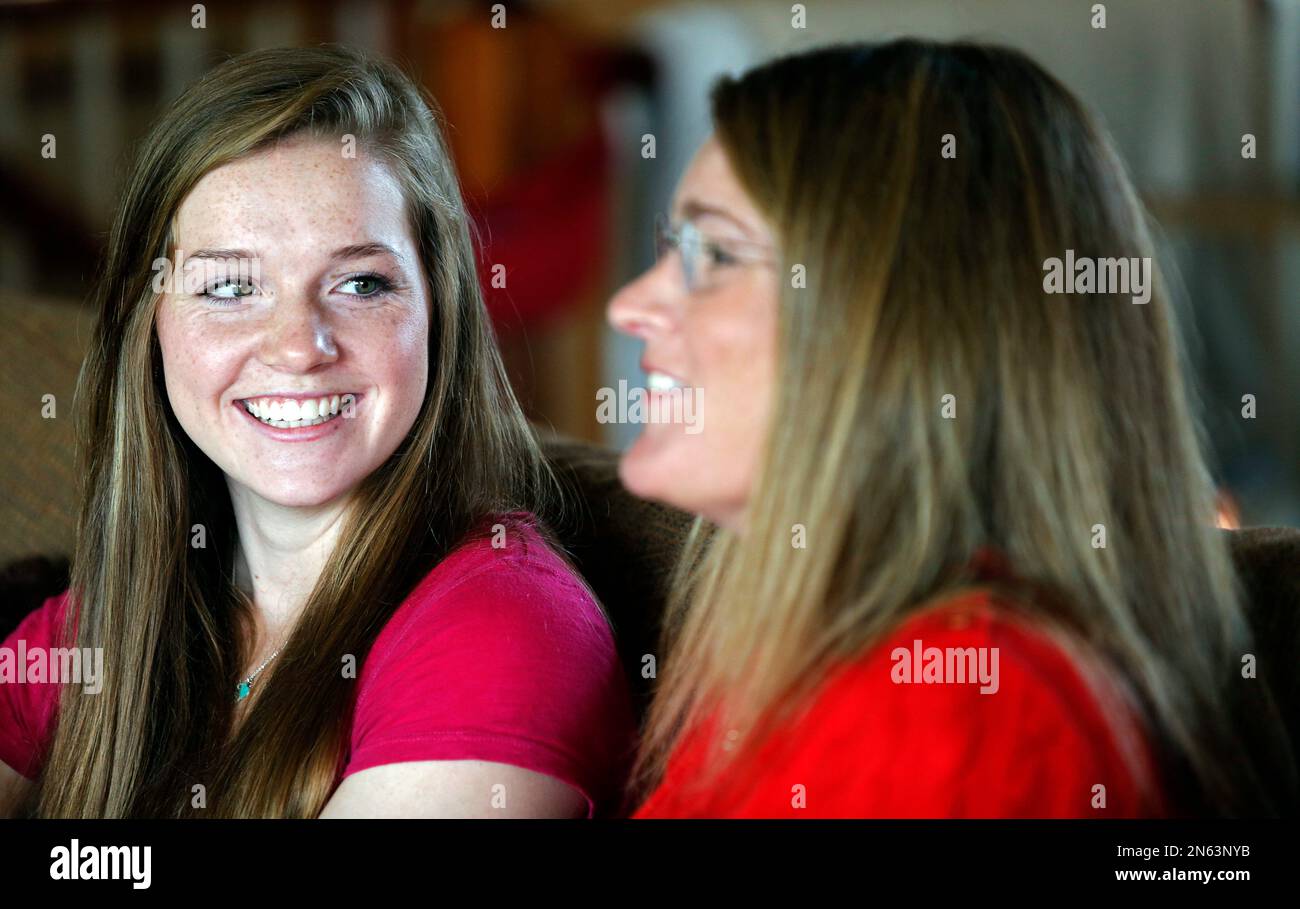 In this Aug. 14, 2013 photo, downhill skiing Olympic gold medalist