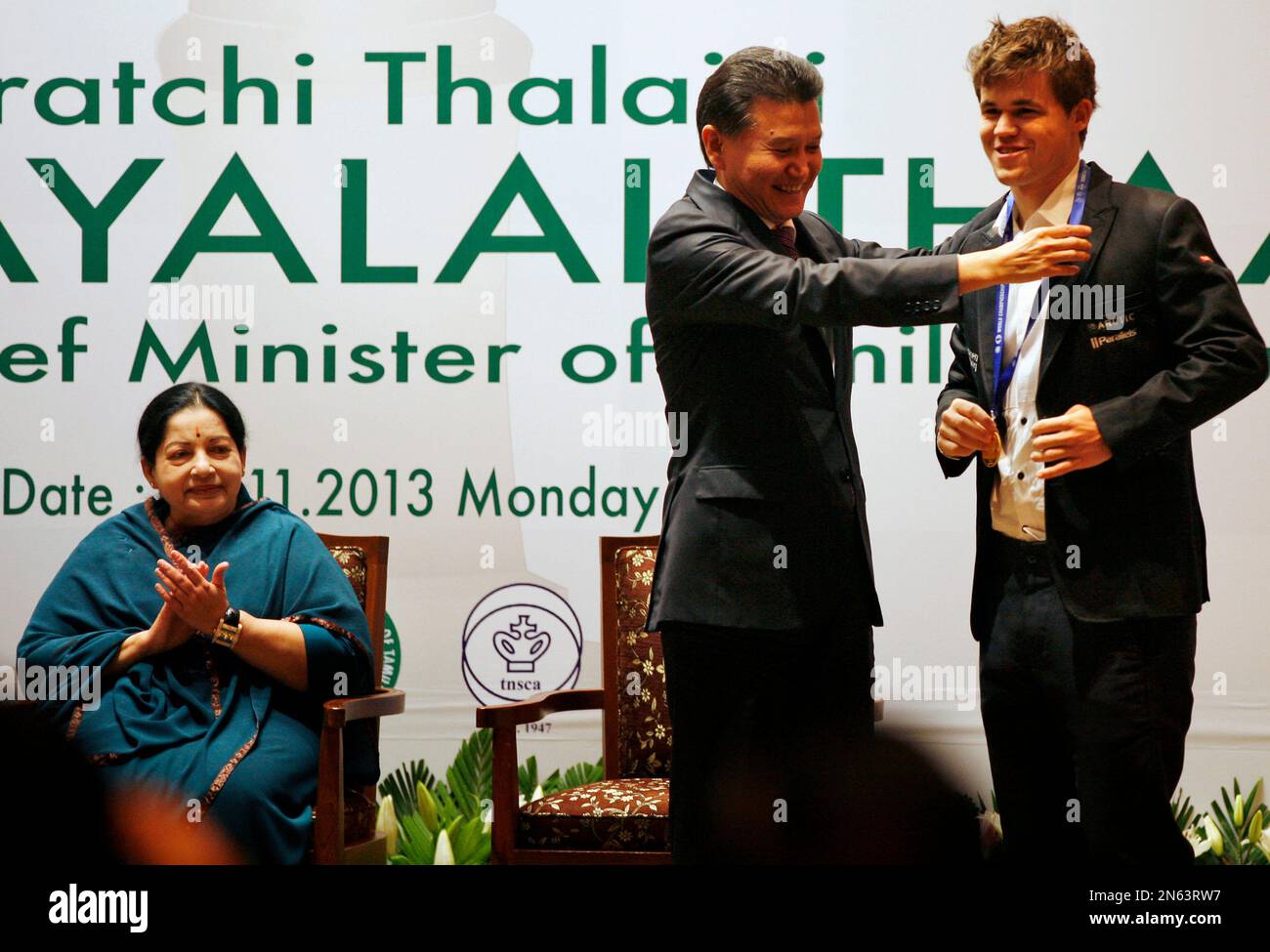 World chess champion Viswanathan Anand of India holds a trophy at an award  presentation ceremony of the FIDE World Chess Championship in Moscow,  Russia, Thursday, May 31, 2012. Anand oretained his title