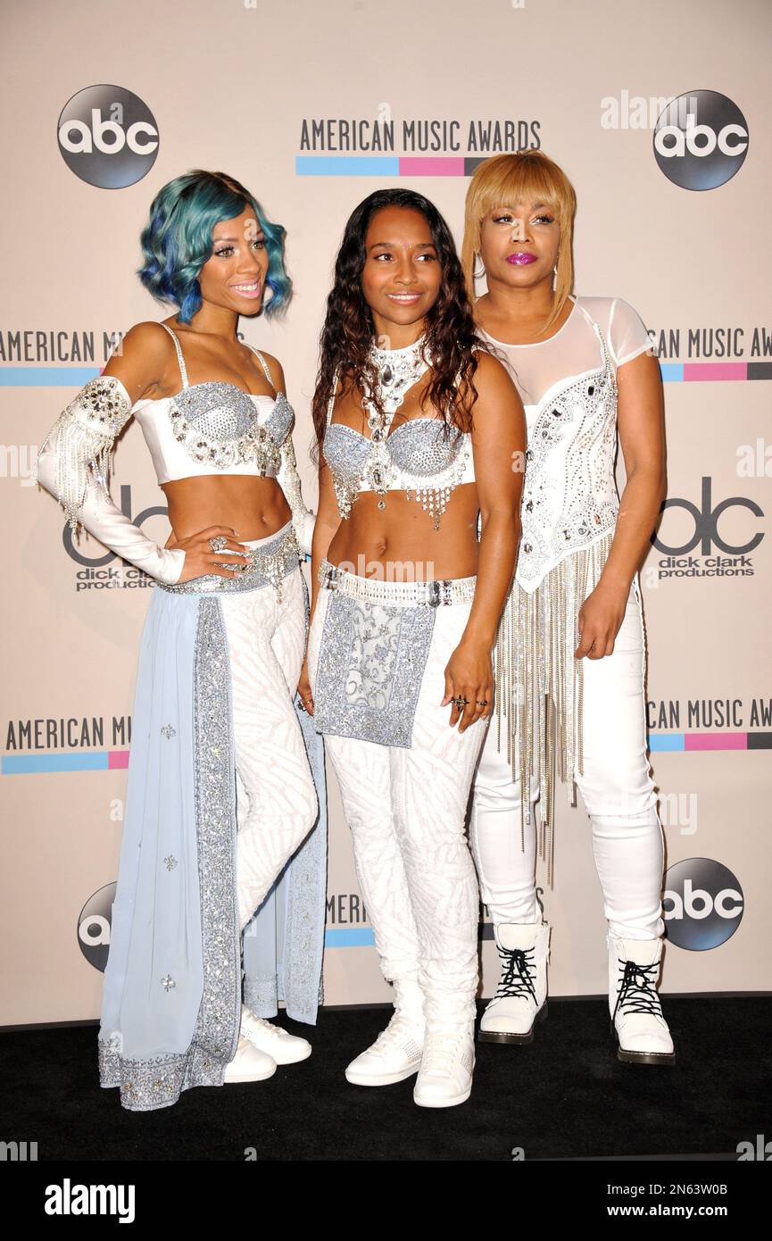 From right, TBoz and Chilli of the musical group TLC pose with Lil