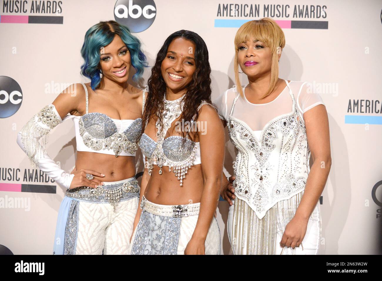 From right, TBoz and Chilli of the musical group TLC pose with Lil