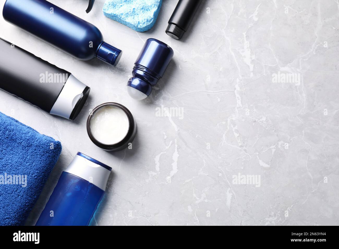 Flat lay composition with men's cosmetics on light grey marble ...