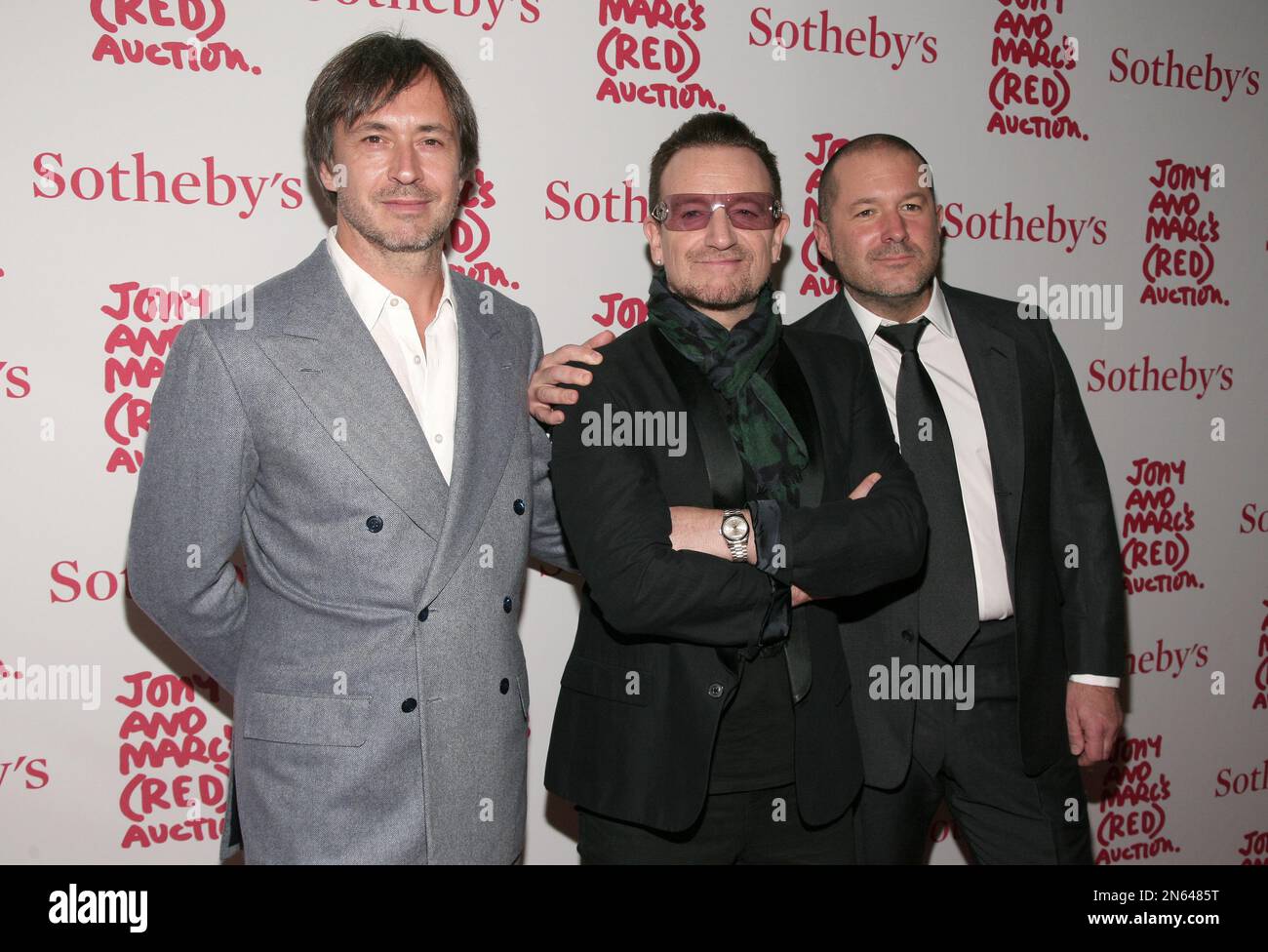From left, industrial designer Marc Newson, recording artist Bono
