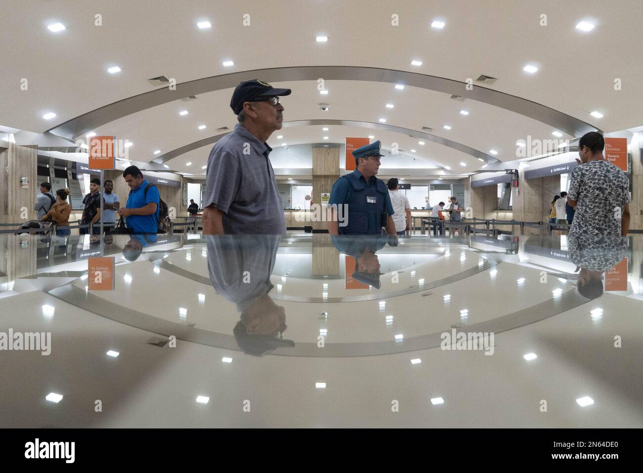 Santiago, Metropolitana, Chile. 9th Feb, 2023. People walk inside a bank in Santiago, Chile. (Credit Image: © Matias Basualdo/ZUMA Press Wire) EDITORIAL USAGE ONLY! Not for Commercial USAGE! Stock Photo
