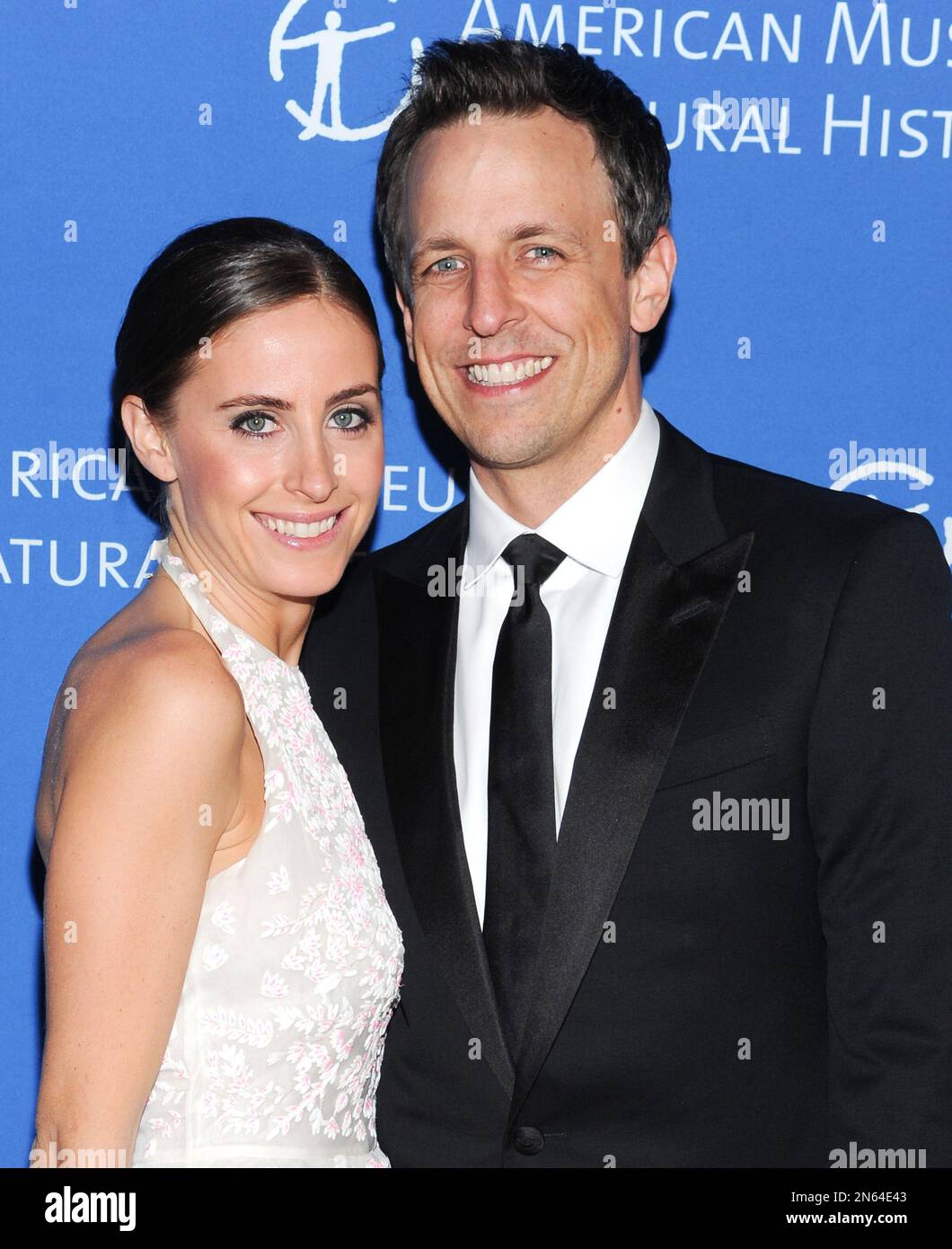 Former SNL cast member Seth Meyers and his wife Alexi Ashe attend the