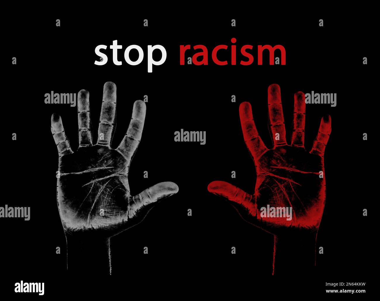 Stop Racism. Hand prints on dark background Stock Photo