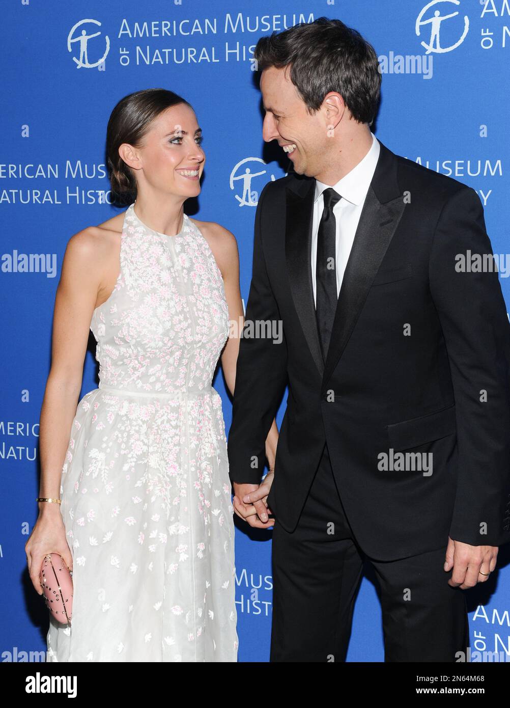 Former SNL cast member Seth Meyers and his wife Alexi Ashe attend the