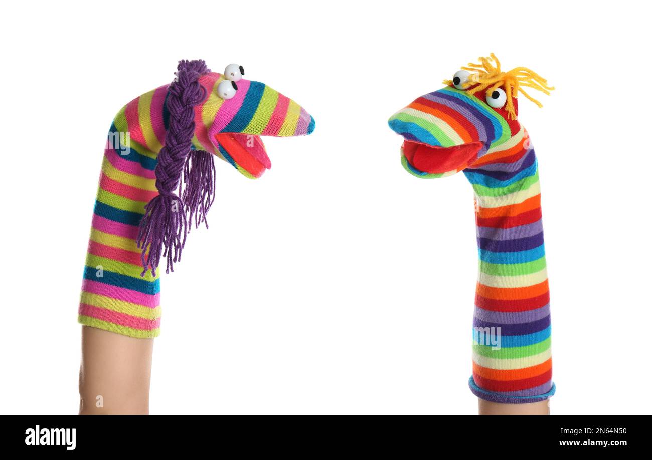 Funny sock puppets for show on hands against white background Stock Photo