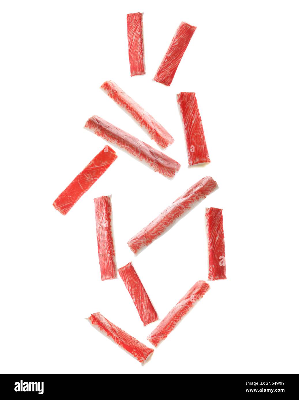 Many fresh crab sticks falling on white background Stock Photo Alamy