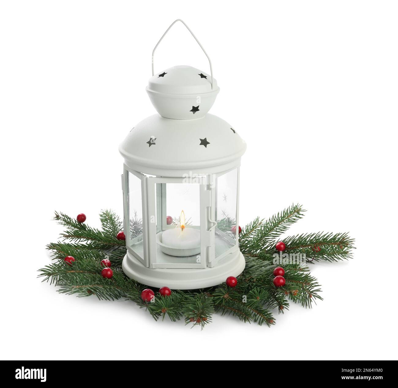 Decorative Christmas lantern and coniferous twigs on white background Stock Photo