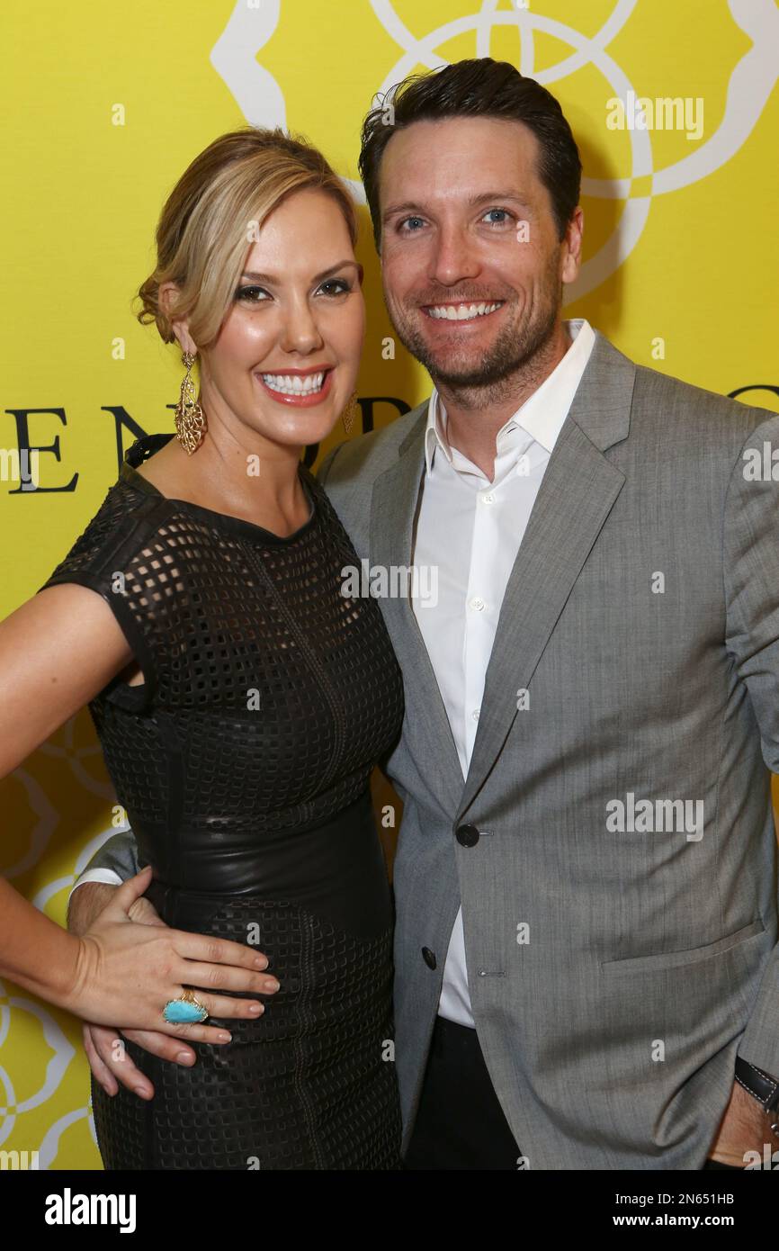 From left, Kendra Scott and Matt Davis pose during the Luxe Party at the Kendra  Scott Fashion Island Boutique on Tuesday, November 20, 2013, in Newport  Beach, Calif. (Photo by Ryan Miller/Invision/AP