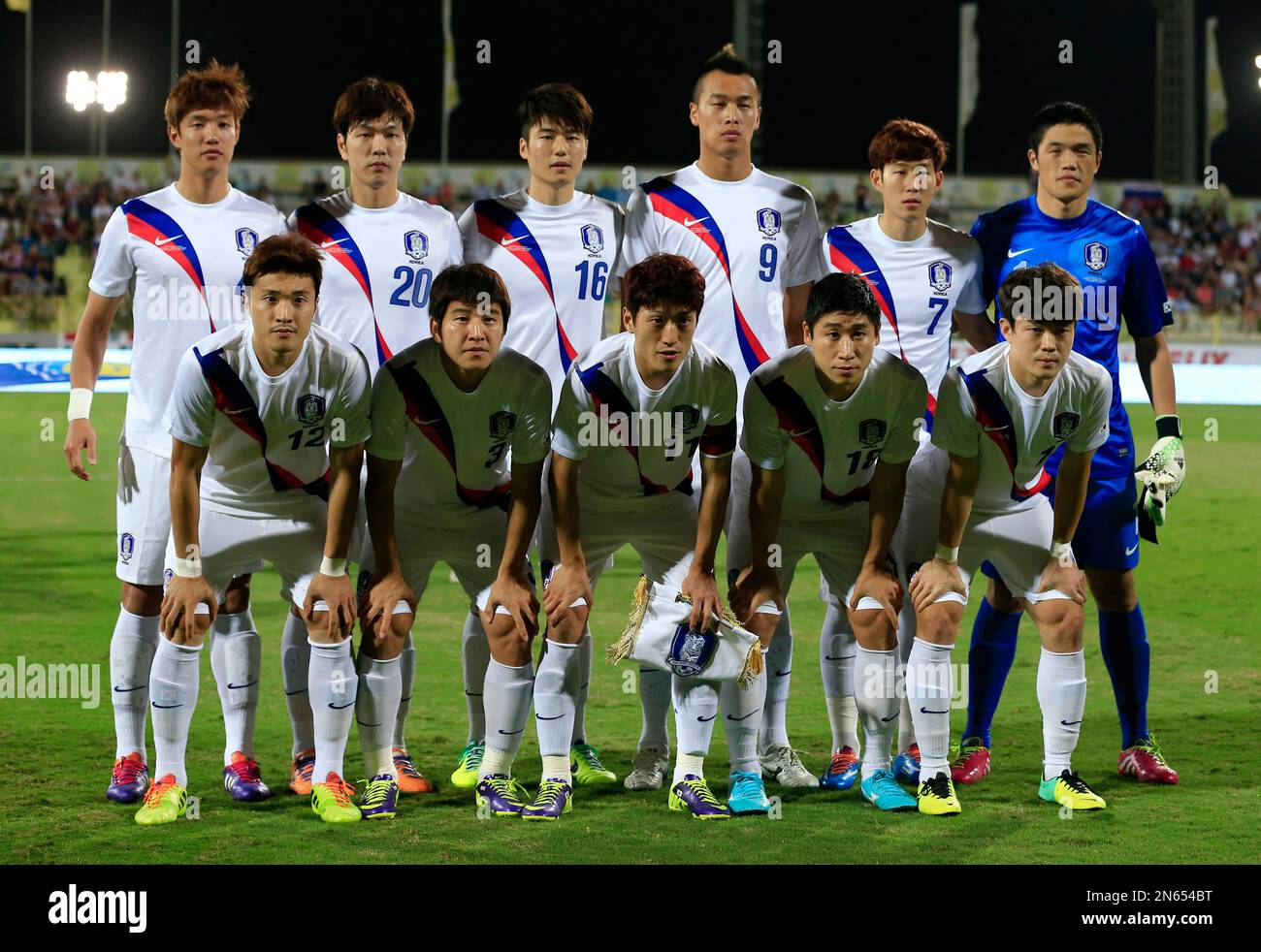 The South Korean national soccer team pose for a group photo ahead of