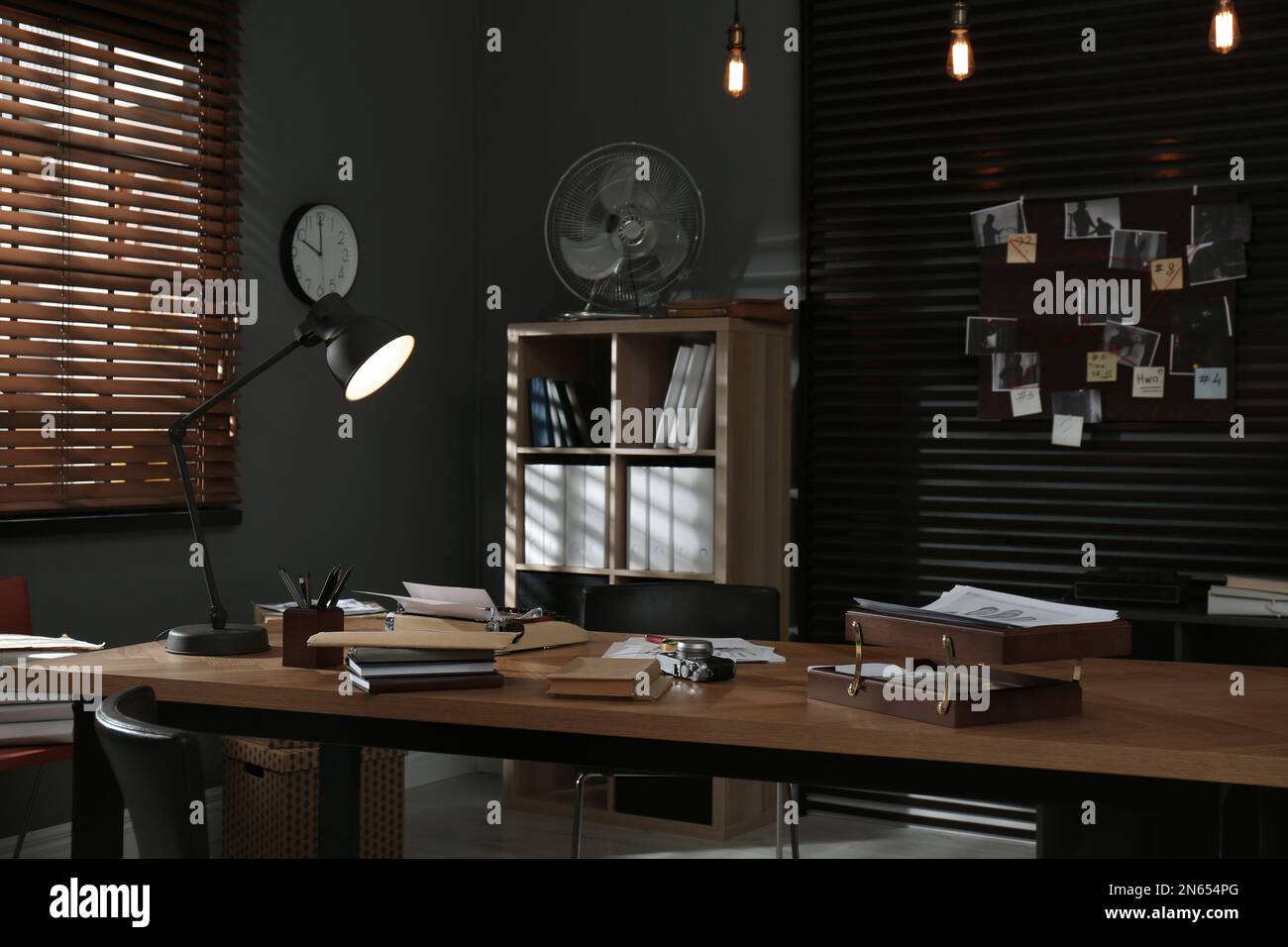 Detective office interior with evidence board on wall Stock Photo - Alamy