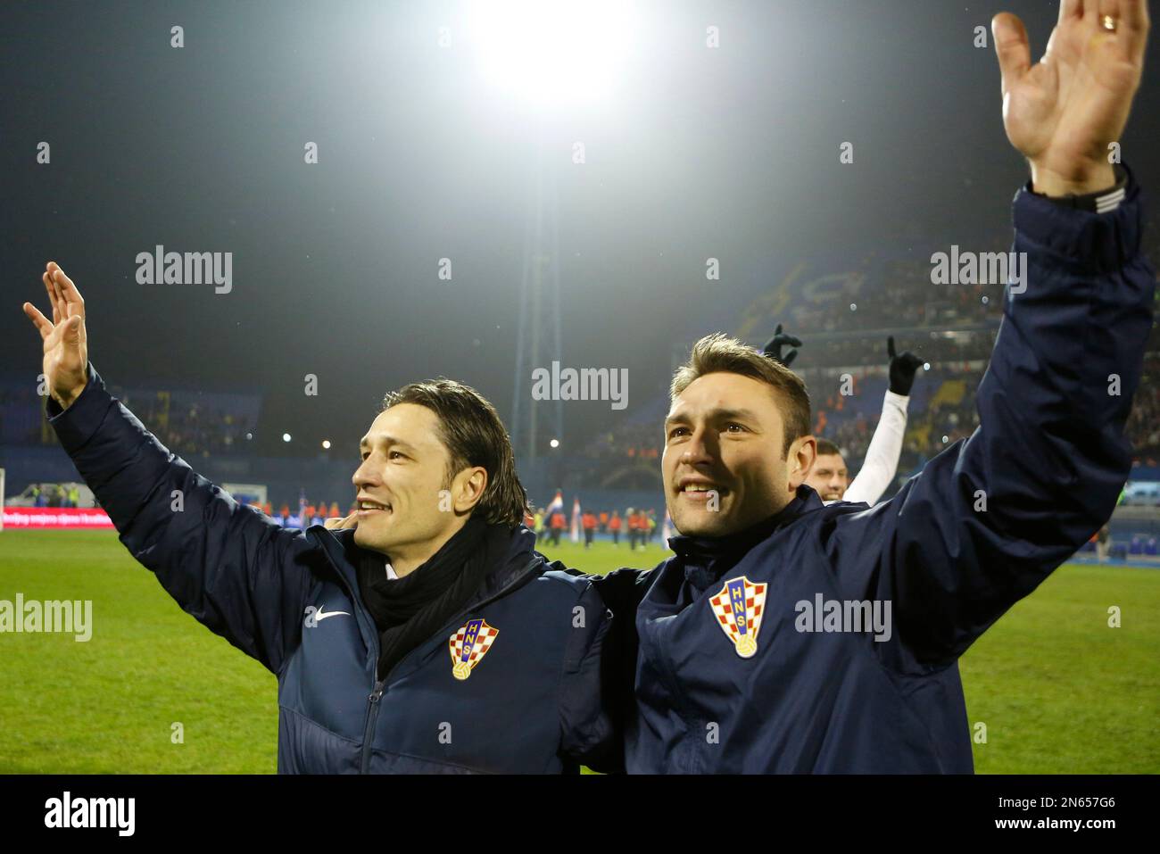 Croatia's head coach Niko Kovac, left and his brother and assistant Robert  Kovac celebrate their victory over Iceland during their World Cup  qualifying playoff second leg soccer match in Zagreb, Croatia, Tuesday,
