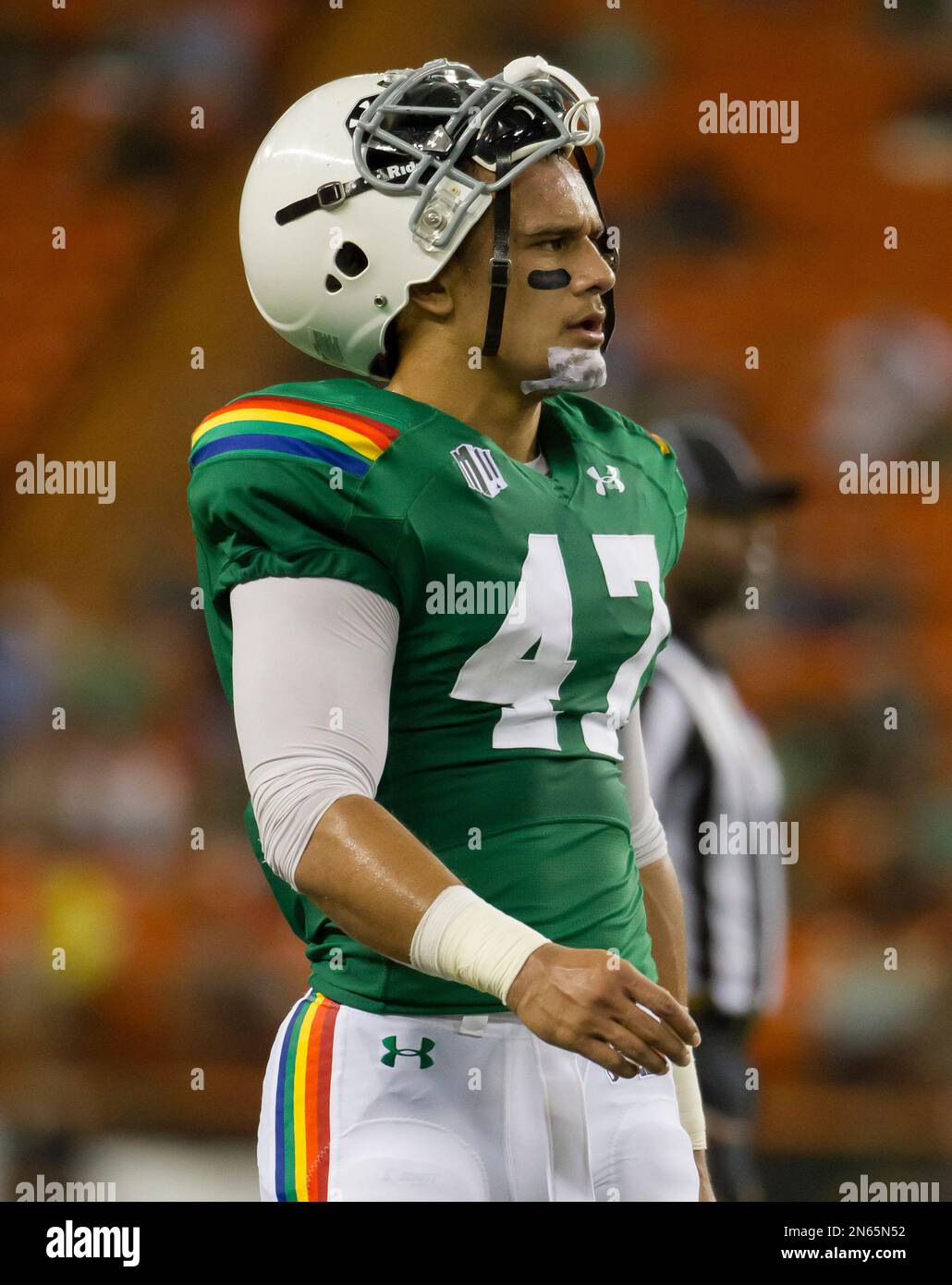Hawaii linebacker Kamalani Alo (47) looks on during a break in the game in  the second quarter of an NCAA college football game Saturday, Nov. 16,  2013, in Honolulu. (AP Photo/Eugene Tanner