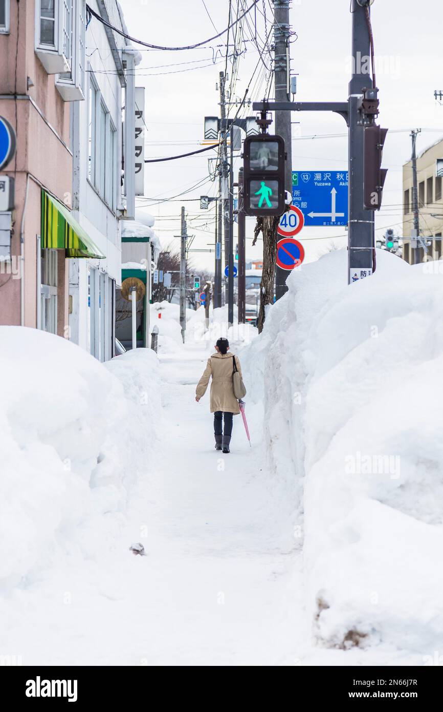 Sidewalk separated by snow wall, Life in a snow country, famous city by heavy snowfall, Yokote city, Akita, Tohoku, Japan, East Asia, Asia Stock Photo