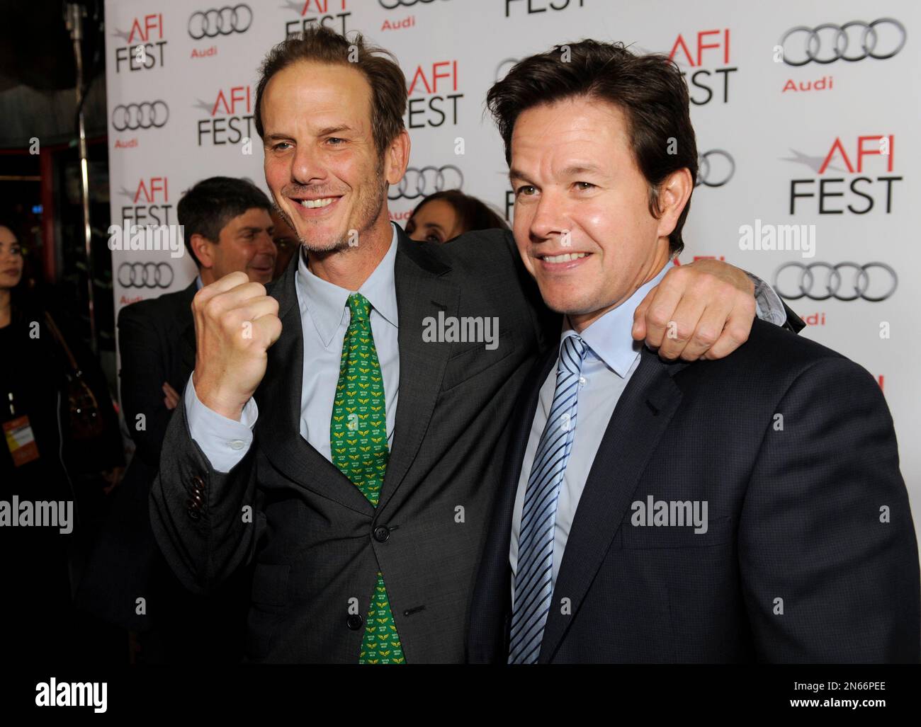 Peter Berg, left, and Mark Wahlberg arrive at the AFI