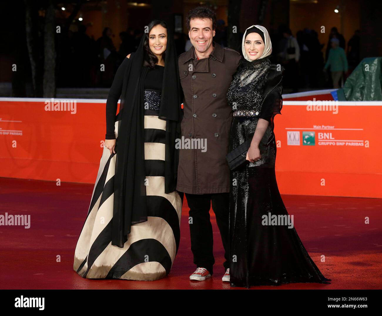 From Left Actress Dana Keilani Director Alessio Cremonini And Actress From Left Actress Dana Keilani Director Alessio Cremonini And Actress Sara El Debuch Pose For During The Red Carpet For The Movie Border At The 8th Edition Of The Rome Film Festival In Rome Tuesday Nov 12 2013 Ap Photoap Borgia 2N66W63 