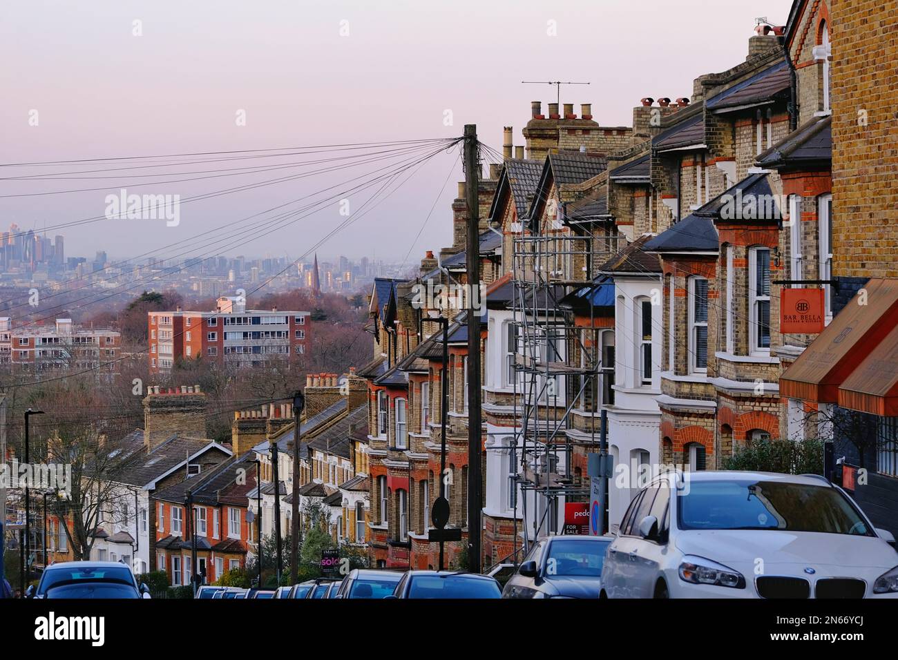 London, UK. A streetview of houses in Crystal Palace with the City of London buildings seen in the distance. Stock Photo