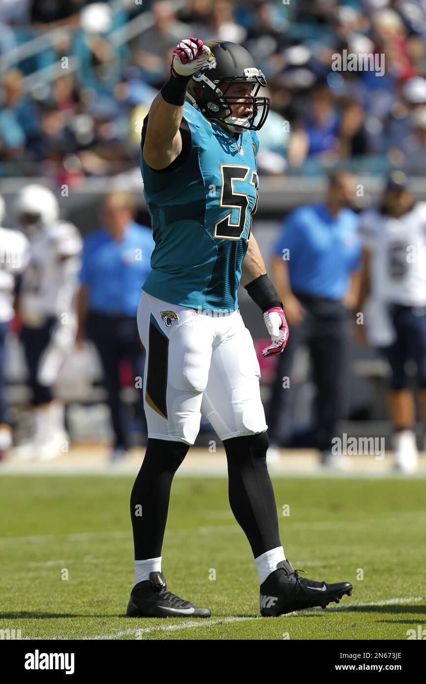 Jacksonville Jaguars' middle linebacker Paul Posluszny (51) signals to