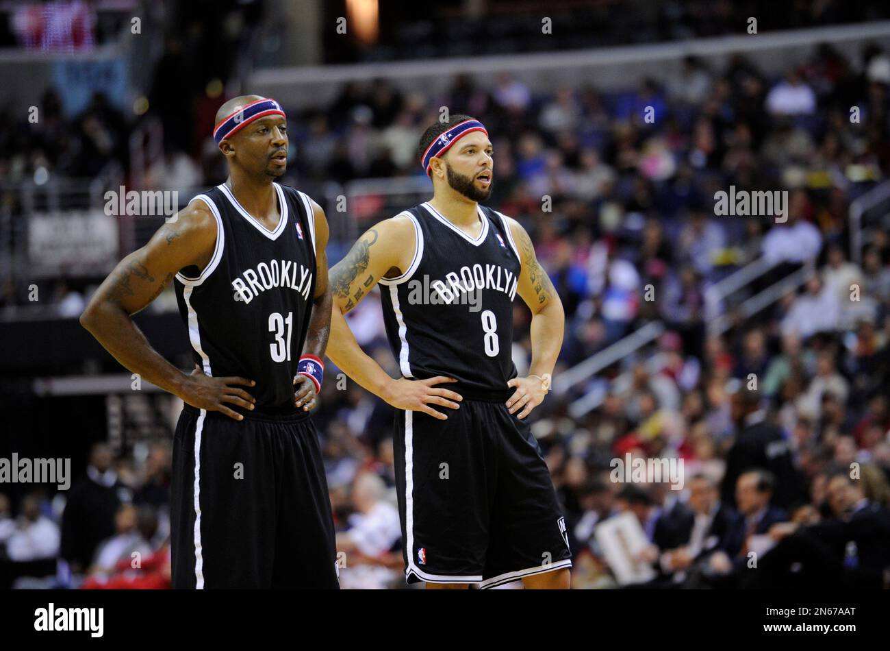 Brooklyn Nets point guard Deron Williams (8) and Jason Terry (31) look