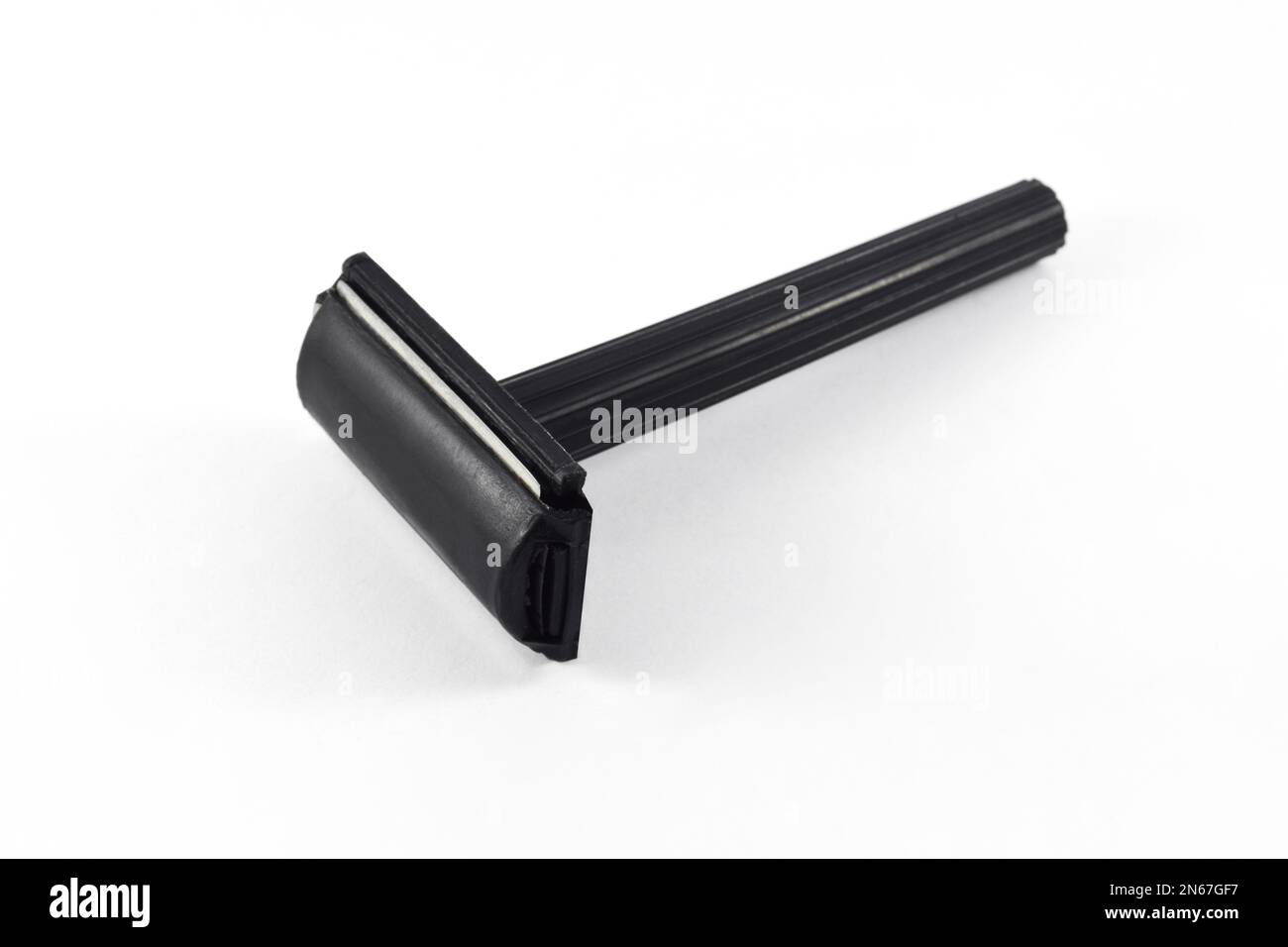 razor blade isolated on white background. Mustache and beard trimmer