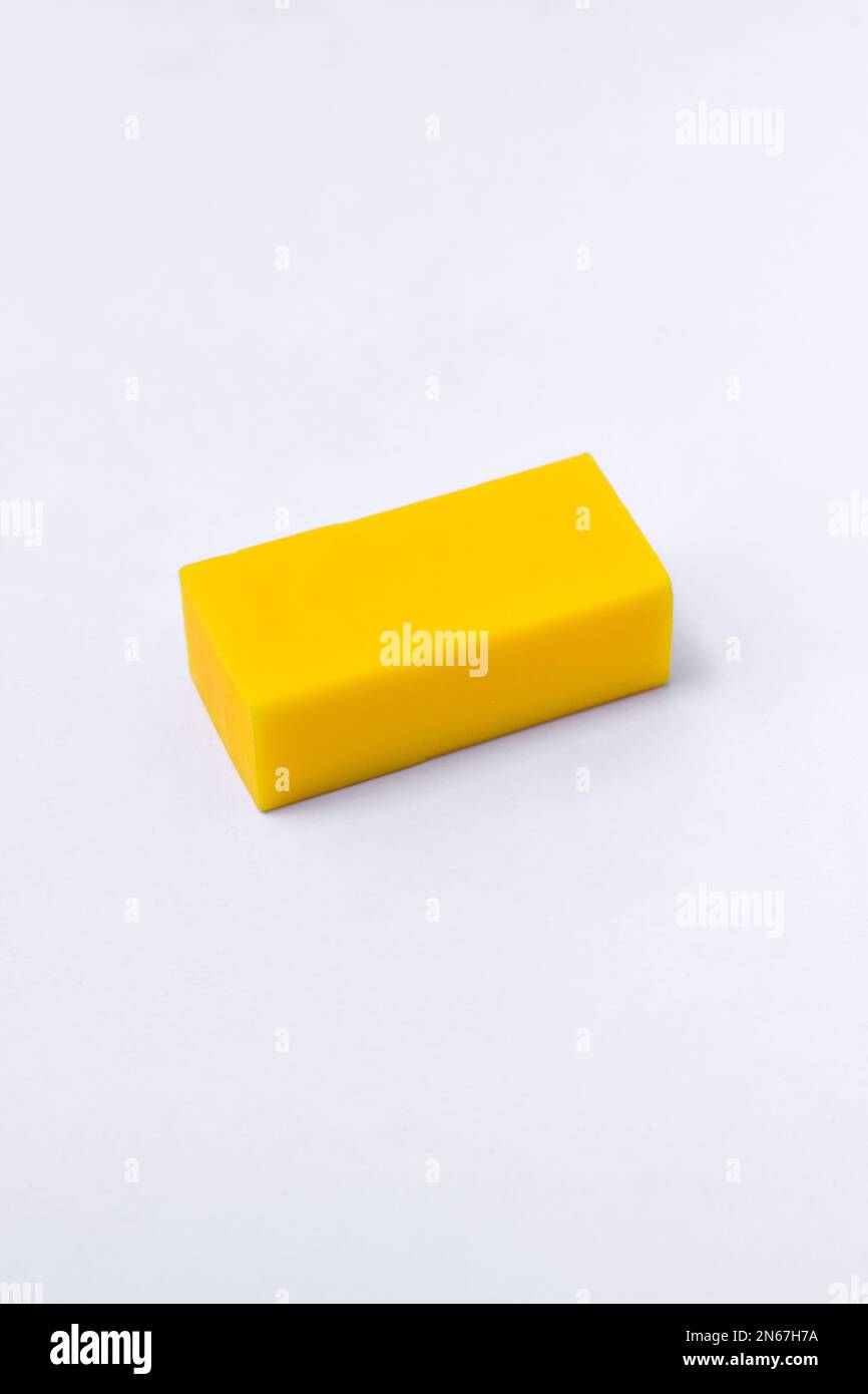 Yellow eraser isolated on white background Stock Photo Alamy