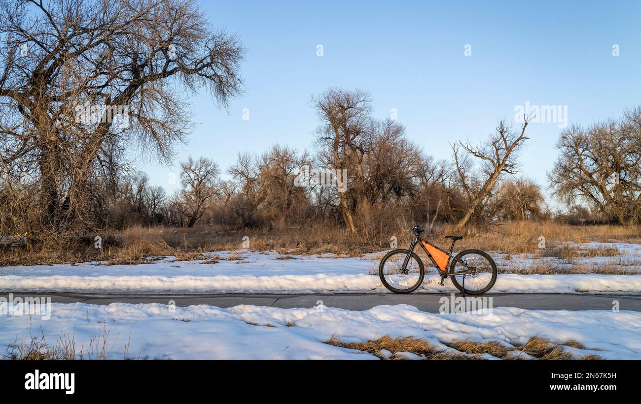 mountain bike on Poudre River Trail near Greeley in Colorado, winter scenery Stock Photo