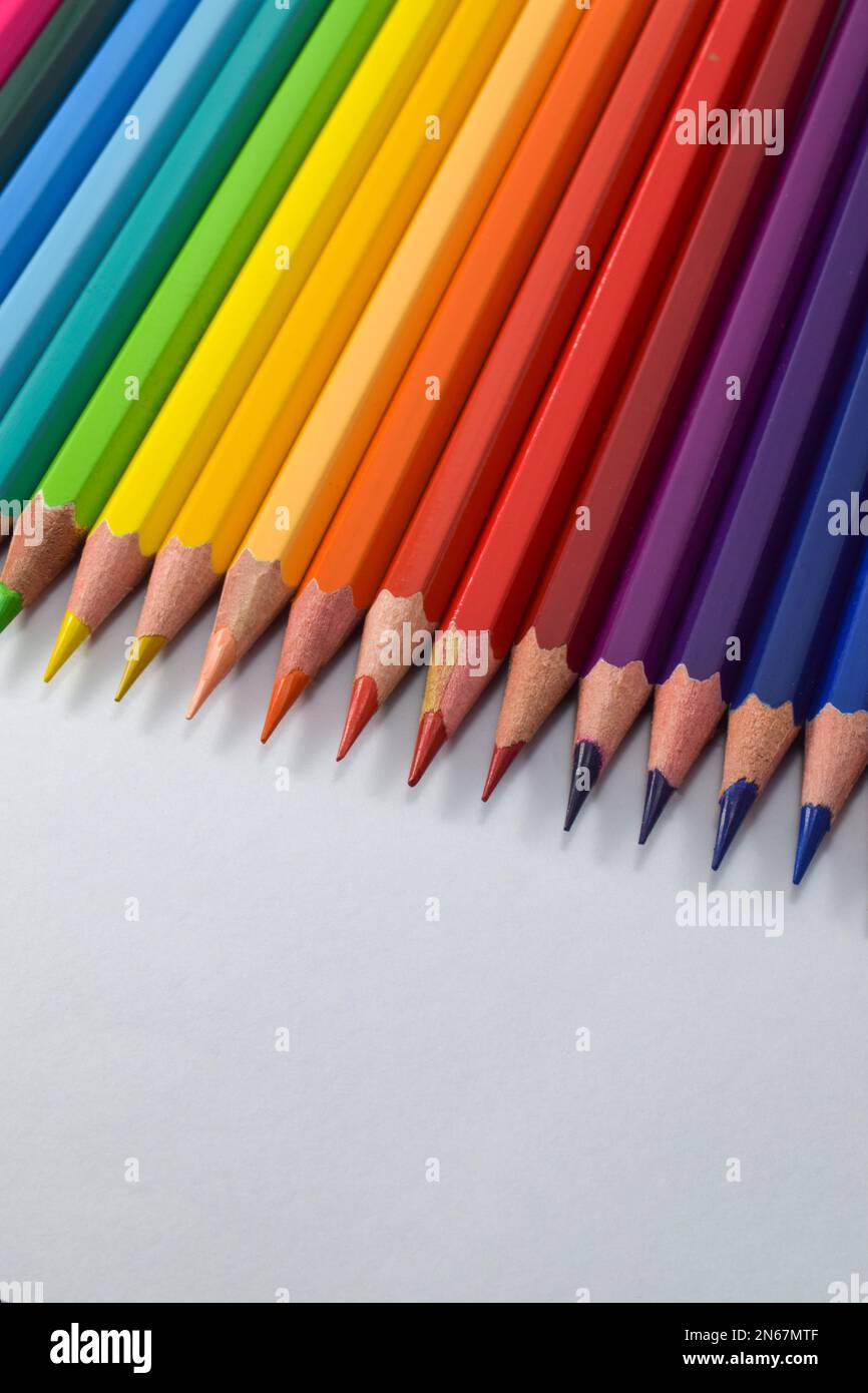 Close-Up color pencils and markers in metal glass on white background Stock  Photo - Alamy