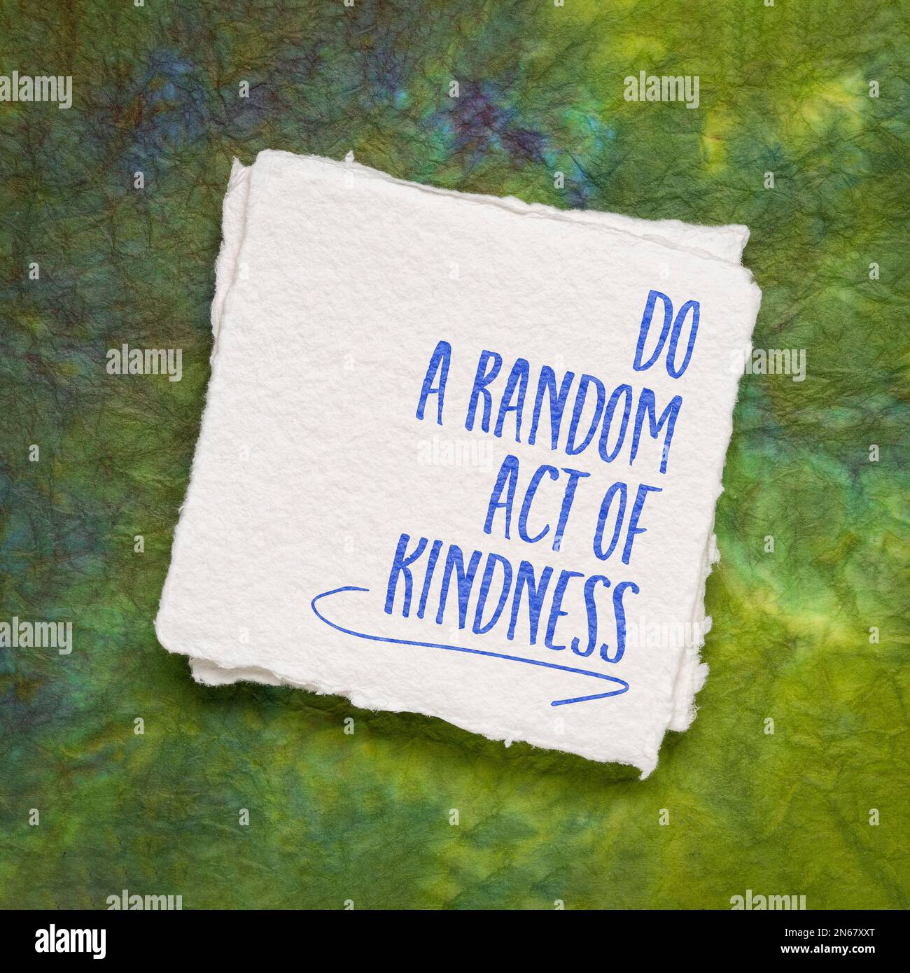 do a random act of kindness inspirational note on an art paper, social concept Stock Photo