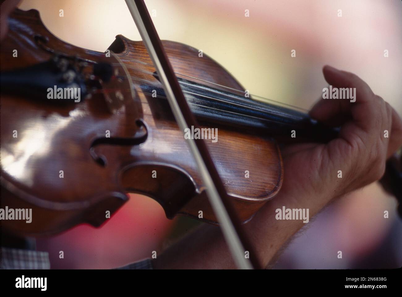 Close-up of a musician playing a violin Stock Photo