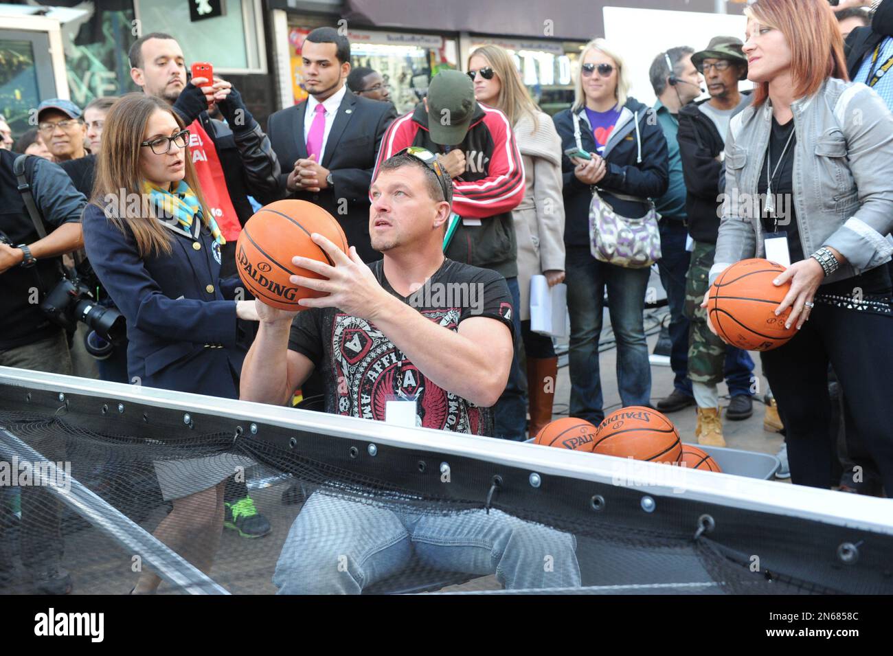 Bobby Brantley, left, and Amy Shirley of Lizard Lick Towing attempt the