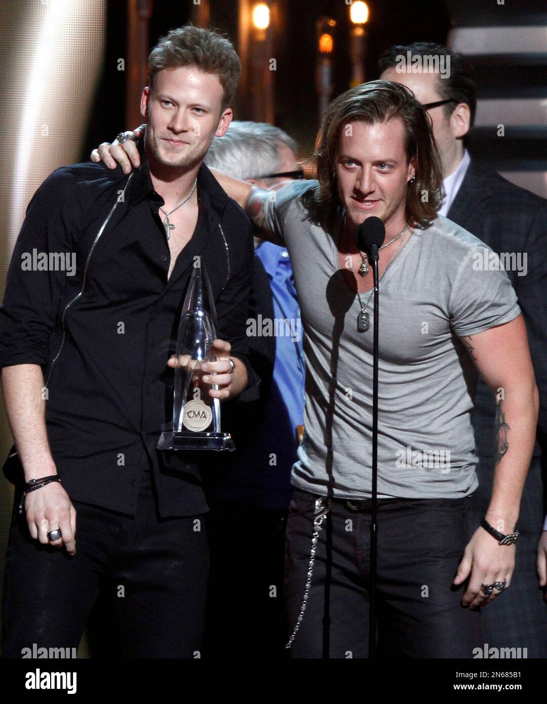 Tyler Hubbard, right, and Brian Kelley, of Florida Georgia Line, accept the  award for single of the year for "Cruise" at the 47th annual CMA Awards at  Bridgestone Arena on Wednesday, Nov.