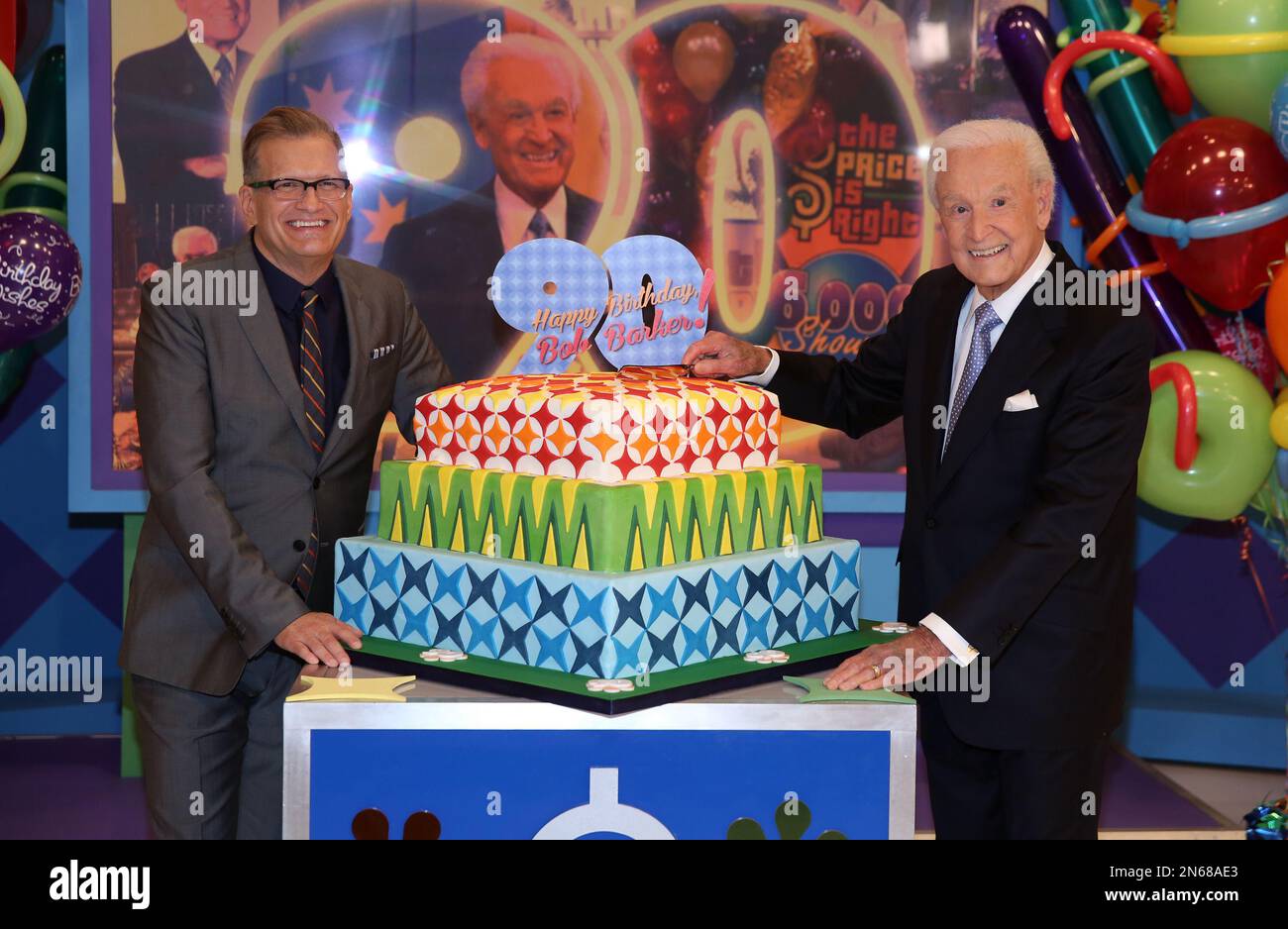 Bob Barker, right, and Drew Carey pose for a photo on the set of "The 